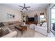 Comfortable living room with sectional sofa and large flat screen TV at 34303 Sahalee Loop, Dade City, FL 33525