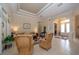 Bright living room featuring tile floors and a view to the entry at 34303 Sahalee Loop, Dade City, FL 33525