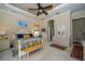 Main bedroom with a queen bed and built-in dresser at 34303 Sahalee Loop, Dade City, FL 33525
