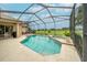 Screened pool and spa with golf course view at 34303 Sahalee Loop, Dade City, FL 33525