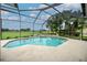 Screened pool and spa with golf course view at 34303 Sahalee Loop, Dade City, FL 33525