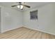 Bright bedroom with ceiling fan and laminate wood flooring at 3523 Blayton St, New Port Richey, FL 34652