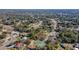 Aerial view of neighborhood tennis courts and homes at 377 Jenico Ct, Spring Hill, FL 34609