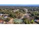 Aerial view of neighborhood tennis courts and surrounding homes at 377 Jenico Ct, Spring Hill, FL 34609