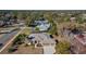 Aerial view of a single-Gathering home with a two-car garage and a landscaped yard at 377 Jenico Ct, Spring Hill, FL 34609