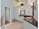 Elegant bathroom with a double vanity, granite countertops and spacious layout at 377 Jenico Ct, Spring Hill, FL 34609