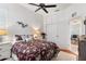 Spacious bedroom with a queen bed, ample closet space, and ceiling fan at 377 Jenico Ct, Spring Hill, FL 34609
