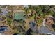 Community features include tennis courts and ample green space at 377 Jenico Ct, Spring Hill, FL 34609