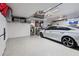 Garage with overhead storage and ample space for one car at 377 Jenico Ct, Spring Hill, FL 34609