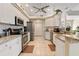 Modern kitchen with stainless steel appliances and granite countertops at 377 Jenico Ct, Spring Hill, FL 34609