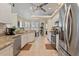 Modern kitchen with stainless steel appliances and granite countertops at 377 Jenico Ct, Spring Hill, FL 34609