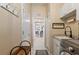 Laundry room with washer, dryer, cabinets, and utility sink at 377 Jenico Ct, Spring Hill, FL 34609