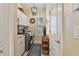 Bright laundry room with washer, dryer, and built-in cabinets at 377 Jenico Ct, Spring Hill, FL 34609