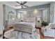 Serene main bedroom with a plush bed and ample natural light at 377 Jenico Ct, Spring Hill, FL 34609