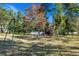 Playground with multiple swings set in grassy area at 377 Jenico Ct, Spring Hill, FL 34609