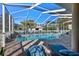 Inviting screened pool area with lounge chairs, ready for relaxation at 377 Jenico Ct, Spring Hill, FL 34609