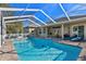 Relaxing screened pool and patio, perfect for outdoor enjoyment at 377 Jenico Ct, Spring Hill, FL 34609