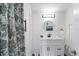 Clean bathroom with white vanity and walk-in shower at 3820 Gulf Blvd # 203, St Pete Beach, FL 33706