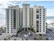 Front view of beachfront high-rise building, Sea Esta at 3820 Gulf Blvd # 203, St Pete Beach, FL 33706