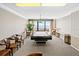 Ocean view game room, complete with a pool table and comfortable seating at 3820 Gulf Blvd # 203, St Pete Beach, FL 33706