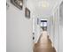 Hallway with light wood flooring and ocean view at 3820 Gulf Blvd # 203, St Pete Beach, FL 33706