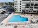 Aerial view of a corner pool at a beachfront high-rise at 3820 Gulf Blvd # 203, St Pete Beach, FL 33706