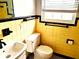 Retro bathroom with yellow and black tile, updated fixtures at 3843 19Th N Ave, St Petersburg, FL 33713