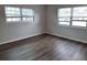 Bedroom with dark gray vinyl flooring and neutral walls at 3843 19Th N Ave, St Petersburg, FL 33713
