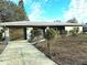 Updated single story home with modern garage door and landscaping at 3843 19Th N Ave, St Petersburg, FL 33713
