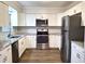 Modern kitchen with stainless steel appliances and granite countertops at 3843 19Th N Ave, St Petersburg, FL 33713