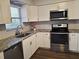 Modern kitchen with granite countertops and stainless steel appliances at 3843 19Th N Ave, St Petersburg, FL 33713
