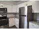 Modern kitchen with stainless steel appliances and granite countertops at 3843 19Th N Ave, St Petersburg, FL 33713