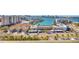 Aerial view of coastal townhouses, ocean views and neighborhood amenities at 400 Island Way # 1404, Clearwater Beach, FL 33767