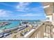 Expansive balcony view showcasing the city skyline, waterfront, and clear blue skies at 400 Island Way # 1404, Clearwater Beach, FL 33767