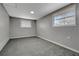 Spacious bedroom with grey carpeting and neutral walls at 40242 Sunburst Dr, Dade City, FL 33525