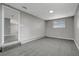Spacious bedroom with grey carpeting and neutral walls at 40242 Sunburst Dr, Dade City, FL 33525