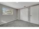 Simple bedroom with gray walls and carpet flooring at 40242 Sunburst Dr, Dade City, FL 33525