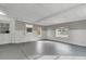 Spacious bonus room with windows and vinyl paneling at 40242 Sunburst Dr, Dade City, FL 33525