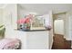 Bright entryway with view into living and kitchen areas at 501 Knights Run Ave # 2214, Tampa, FL 33602