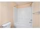 Clean bathroom features a shower over tub with white tile and modern fixtures at 5038 White Sanderling Ct, Tampa, FL 33619