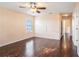 Bright, open bedroom with sleek dark floors and natural light at 5038 White Sanderling Ct, Tampa, FL 33619