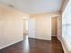 Spacious bedroom with hardwood floors and easy access to hallway and walk-in closet at 5038 White Sanderling Ct, Tampa, FL 33619
