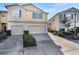 Two-story home featuring attached garages and well-manicured landscaping at 5038 White Sanderling Ct, Tampa, FL 33619