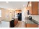 Open kitchen features a large island, stainless steel appliances, and ample cabinet space at 5038 White Sanderling Ct, Tampa, FL 33619