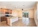 Open concept kitchen with granite countertops and stainless steel appliances at 5038 White Sanderling Ct, Tampa, FL 33619