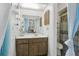Clean bathroom with single sink vanity, shower, and toilet at 5328 Ridgewell Ct, Tampa, FL 33624