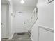 Entryway with white door, staircase, neutral color, and sleek flooring at 5328 Ridgewell Ct, Tampa, FL 33624