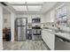 Kitchen features stainless steel appliances, and granite counters at 5328 Ridgewell Ct, Tampa, FL 33624