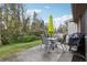 Small patio with table, chairs, and grill at 5328 Ridgewell Ct, Tampa, FL 33624