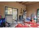 Screened porch with seating and access to backyard at 5328 Ridgewell Ct, Tampa, FL 33624